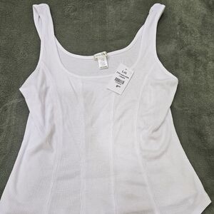 White top 4 vertical lines. Cute with black jeans. Large